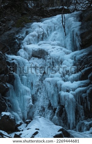 Frozen waterfall and big icicles formed.
