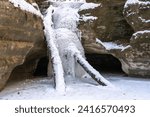Frozen waterfall in Kaskaskia canyon on a frigit winter morning.  Starved Rock state park, Illinois, USA.