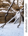 Frozen waterfall in Kaskaskia canyon on a frigit winter morning.  Starved Rock state park, Illinois, USA.