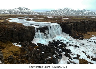 Frozen Waterfall In Þingvellir National Park