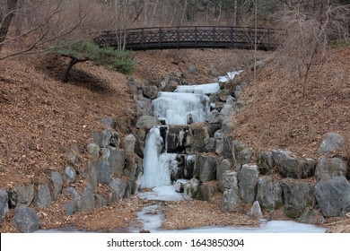 Frozen Waterfall In A Park