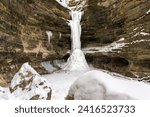 Frozen waterfall in St. Louis canyon on a very cold winters morning.  Starved Rock State Park, Illinois, USA.