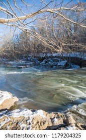 Frozen Waterfalls (Anderson Falls) And River In Winter On A Bright Sunny Day