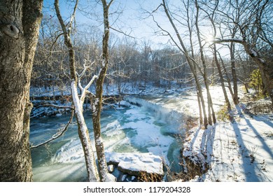 Frozen Waterfalls (Anderson Falls) And River In Winter On A Bright Sunny Day