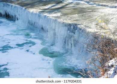 Frozen Waterfalls (Anderson Falls) And River In Winter On A Bright Sunny Day