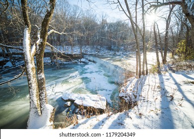 Frozen Waterfalls (Anderson Falls) And River In Winter On A Bright Sunny Day