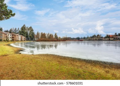 Frozen Waters Of Small Lake On A Winter Morning In Fife, WA. Northwest, USA