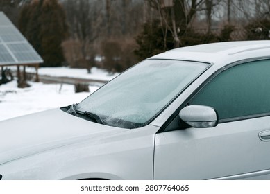 Frozen windshield in blizzard making driving unsafe