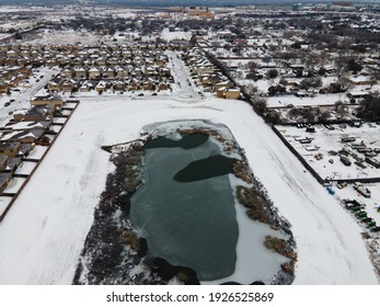 Frozen Winter Texas Landscape Covered In Snow And Ice During Winter Storm Uri Extreme Weather Event Knocked Out Power And Destroyed Pipes Suburb Homes Covered In Snow 2021