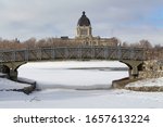 Frozen winter view bridge Saskatchewan legislature building