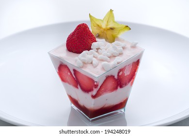 Frozen Yogurt Cake With Pieces Of Strawberry In The Cup