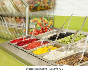 Frozen Yogurt Toppings Bar. Yogurt Toppings Ranging From Fresh Fruits, Nuts, Fresh-cut Candies, Syrups And Sprinkles.