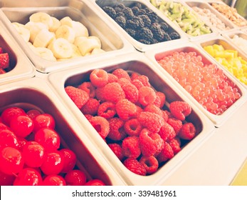 Frozen Yogurt Toppings Bar. Yogurt Toppings Ranging From Fresh Fruits, Nuts, Fresh-cut Candies, Syrups And Sprinkles.