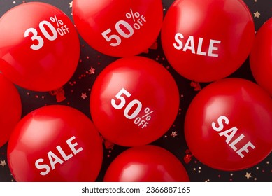 Frugal consumer Black Friday presentation. Top view of red balloons showcasing "discount", "30% savings", "50% off" with decorative tinsel, shiny confetti on black surface, perfect for promo content - Powered by Shutterstock