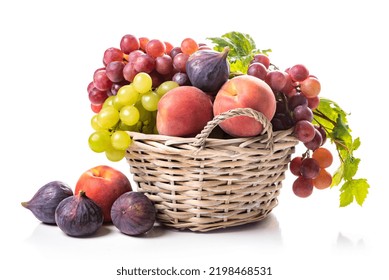 Fruit basket. Grapes, figs and peaches - Powered by Shutterstock