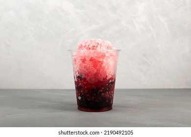 Fruit Berries Iced Cocktail In Disposable Plastic Cup. Slush - Drink. Refreshing Drink With Tapioca Pearls. Take Away Food. Fruit Shaved Ice With Juice.