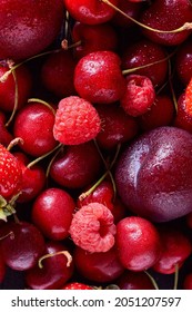 fruit and berry background in large size, beautifully juicy and delicious, cherry, strawberry, raspberry, plum