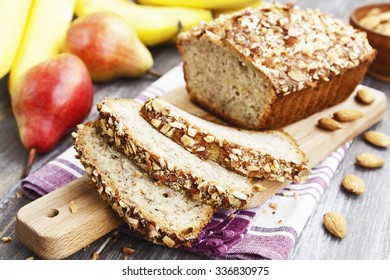  Fruit cake with bananas and pears on the table  - Shutterstock ID 336830975