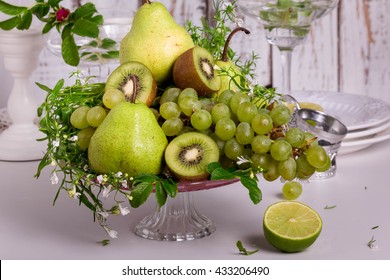 Fruit Centerpiece. Fruit Display Is Perfect For A Party. Fresh Fruit Platter With Kiwi, Grapes And Pears.