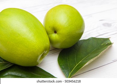 Fruit Of Chinese Quince On Wooden Desk