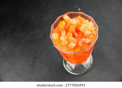 Fruit cocktail pineapple, mango, lychee, apple Canned fruit cocktail tasty snack fresh food background on the table, rustic food, top view, copy space vegetarian and vegan food