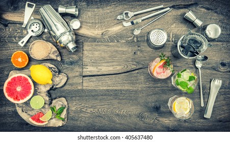 Fruit Drinks With Ice. Cocktail Making Bar Tools, Shaker, Glasses. Flat Lay. Vintage Style Toned Picture