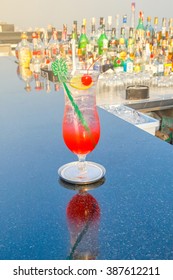 Fruit Fresh Cocktail On The Table At Counter Bar From Rooftop And Restaurant , Selective Focus