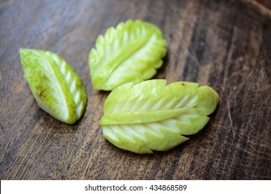 Fruit Guava Carving Food Sculpture Art In Leaf Shape, Thailand Traditional. Background Concept. Abstract Art.