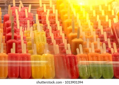 A Lot Of Fruit Ice Cream On A Stick On The Counter Of The Store