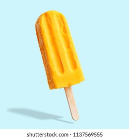 Fruit ice cream on a stick. Bright color, summer mood.