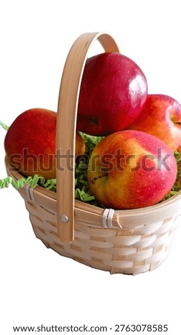 Fruit image showing a rustic wicker-style hamper overflowing with orchard-fresh apple treasures. Photograph of a curated basket of hand-plucked, crunchy apples for the autumn season. Isolated image of a thoughtful, garden-harvested apple display. Photo of a woven container of crisp, homegrown pomes. Juicy red apples elevated for gift or present in a rustic, country-style basket. Healthy Gifting image. Apple picking, autumn harvest, countryside living. Wicker basket of ripe-apples. Small rustic basket of red-apples
Rustic wicker-style container of fresh fruit.