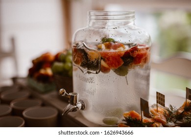 Fruit Infused Flavored Water, Lemonade, Cocktail In A Beverage Dispenser With Fresh Fruits