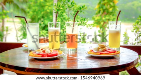 Similar – Infused fruit water cocktails and snacks bowls