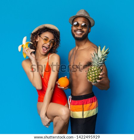 Similar – Image, Stock Photo Black man in swimsuit sitting on sandy beach