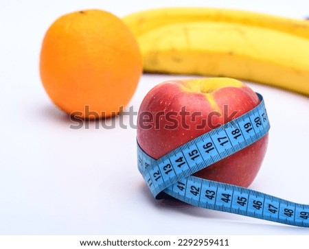 Fruit, orange, apple and banana in a slimming diet