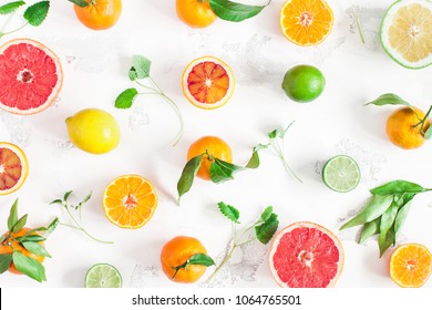 Fruit Pattern. Colorful Fresh Fruits On White Table. Orange, Tangerine, Lime, Lemon, Grapefruit. Flat Lay, Top View