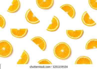 Fruit pattern of orange slices isolated on white background. Top view. Flat lay