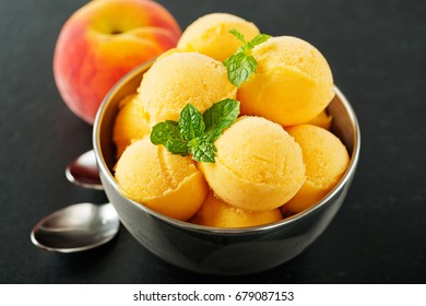 Fruit Peach Sorbet With Mint In A Bowl.