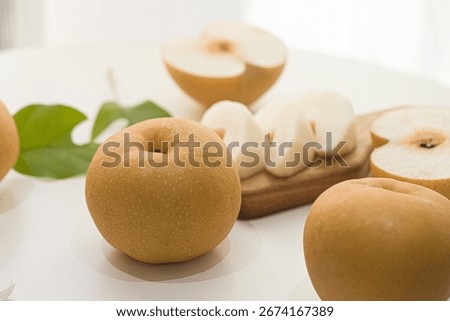 The fruit of the pear.