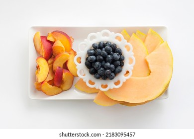 Fruit Platter Tray With Peaches, Blueberries And Canteloupe