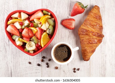 Fruit Salad, Coffee Cup And Croissant