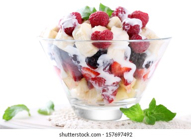 Fruit Salad In Glass Bowl, Isolated On White