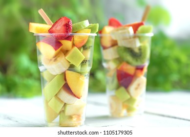 Fruit Salad In Plastic Cups Takeaway. Sliced Organic Fruits And Berries, Healthy Snack To Go, Copy Space.