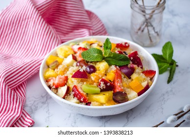 Fruit Salad And Quinoa In A White Bowl 