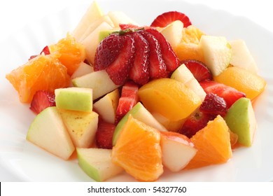 Fruit Salad With Strawberry, Orange, Apple In White Dish