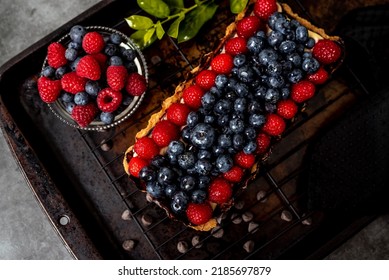 Fruit Tart Full Of Berries With Chocolate And Cream On Cookie Crust. European Dissert.