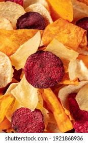 Fruit and vegetable chips texture, overhead close-up shot of a healthy snack