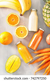 Fruit And Vegetable Smoothies In Glass Jars, Orange Mango Banana Carrot Pineapple