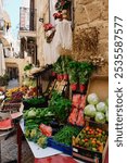 Fruit and vegetable stand on old streets of Bari, Italy.