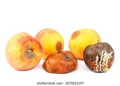 Fruits Of An Apple And Peach With Rot Isolated On White Background.